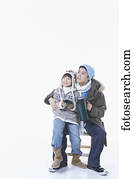 father and son holding the tumbler