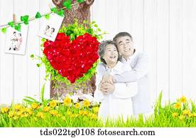 senior couple hugging tightly senior couple hugging tightly