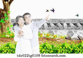 senior couple hugging tightly senior couple hugging tightly