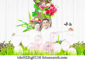 senior couple sitting with balloons senior couple sitting with balloons