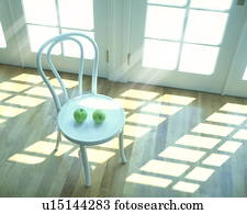 Apples on chair, computer graphic