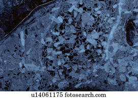 Frost on ground with natural pattern