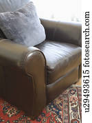 Brown leather armchair