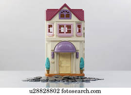 Toy house and coins