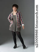 Full Length Studio Portrait Of Teenage Girl