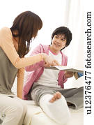 Couple in hospital making travel plans for the future