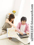 Couple in hospital making travel plans for the future