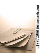 Memo held together with a paper clip