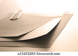 Memo held together with a paper clip