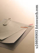 Memo held together with a paper clip