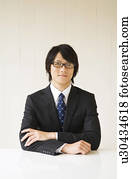 Businessman sitting at table