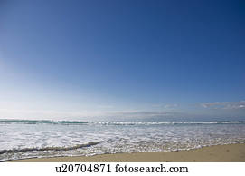 Waves lapping on beach