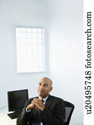 Businessman at office desk.