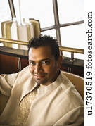 Well-Dressed Man in Bar