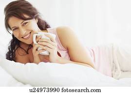 Woman relaxing with a coffee Woman relaxing with a coffee