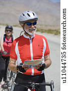 senior couple, riding bikes