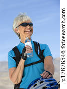 Senior woman drinking water