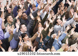 Crowd with arms raised