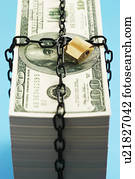 Stack of Dollars secured by padlock and chain