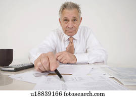Accountant Pointing to Bottom Line