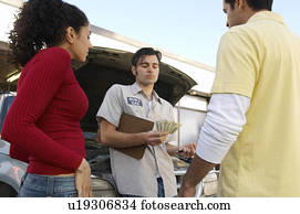 Mechanic counting money by couple