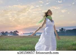 Carefree woman in field