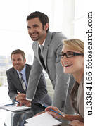 Happy business people at a meeting