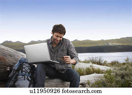 Tourist paying with his credit card