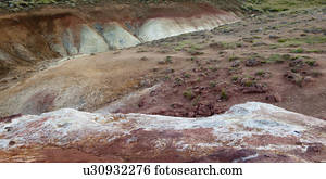 Eroded colourful volcanic mineral rich gully 