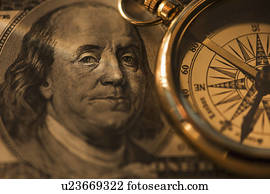 Compass on dollar bill