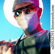 Surgeon carries out microsurgery