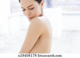 Woman looking over shoulder