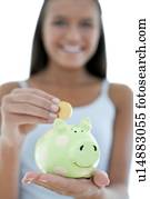 Teenage girl saving money