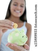 Teenage girl saving money