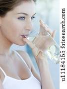 Woman drinking water with lime