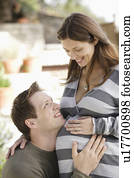 Portrait of expecting couple