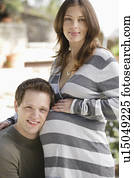Portrait of expecting couple