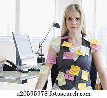 Businesswoman with memo notes on clothes
