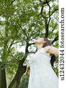 Young Woman Breathing in Fresh Air