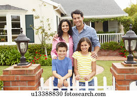 Hispanic family outside home