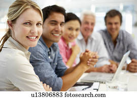 Mixed group in business meeting Mixed group in business meeting