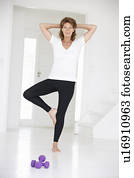 Senior woman in yoga position