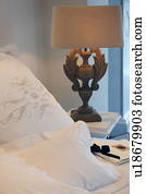 Pillow with imprint and bedside lamp
