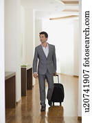 Man walking through hotel