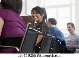 People at work at workstations People at work at workstations