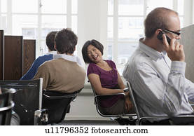 People at work at workstations People at work at workstations