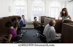 People at work at workstations People at work at workstations