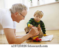 Grandfather playing with grandson