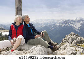 senior couple on mountain summit