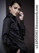 Dark hair beauty on the phone